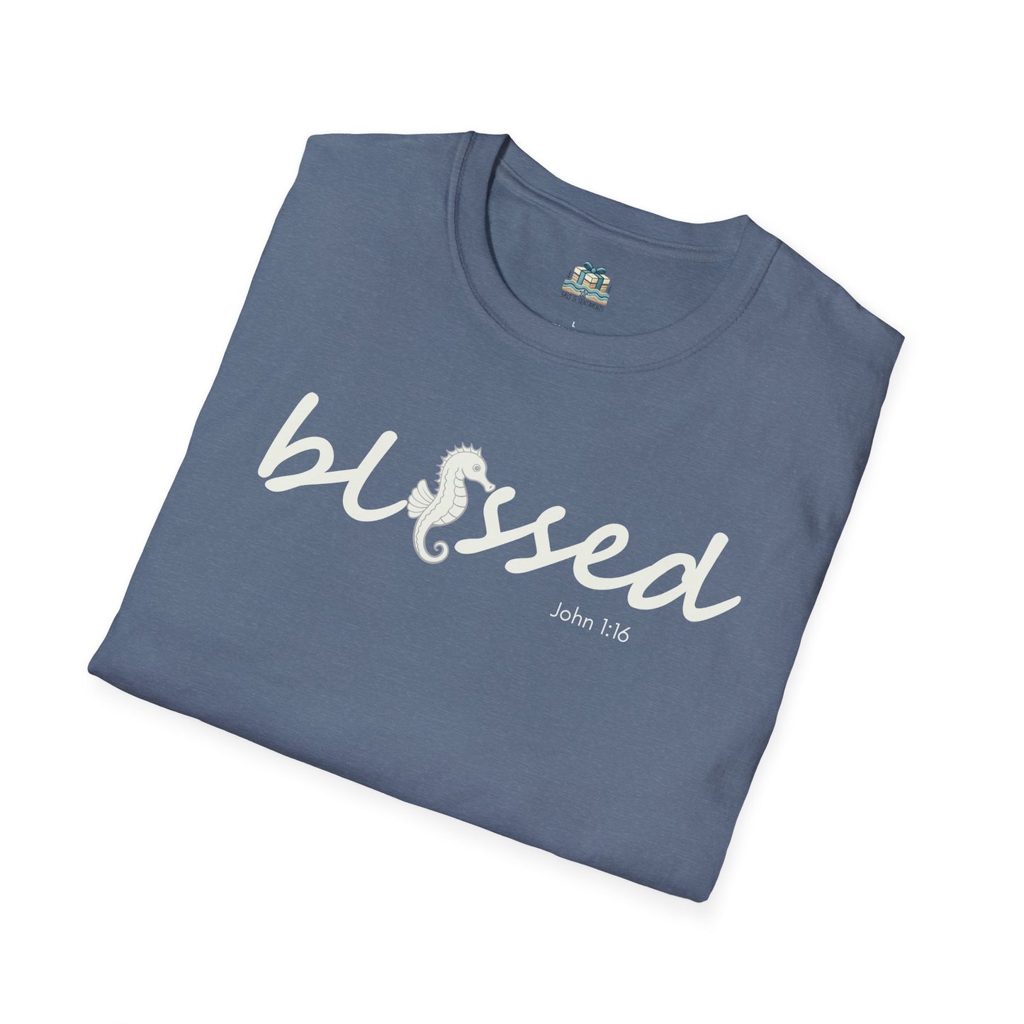 Folded blue t-shirt with 'blessed' text on a white background