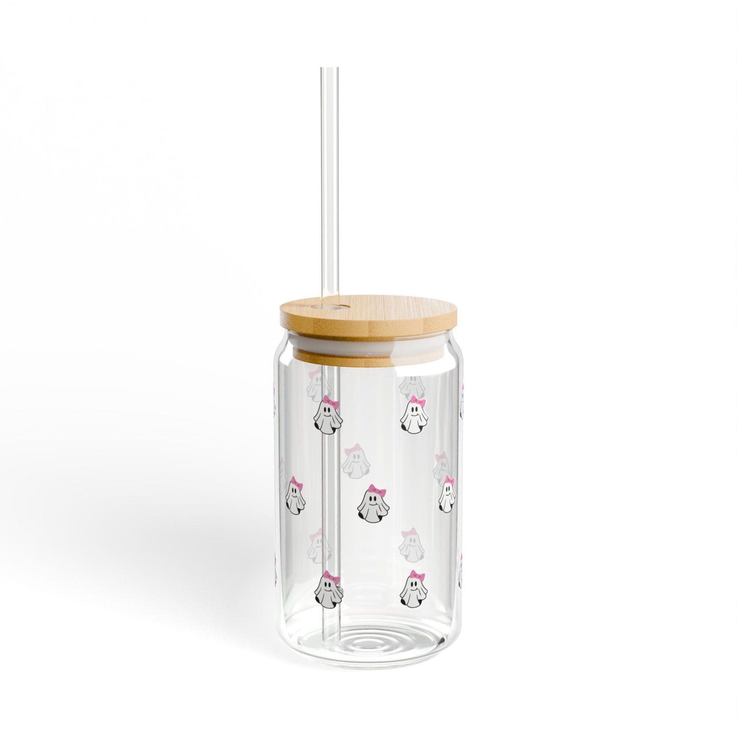 Clear glass tumbler with wooden lid and straw, featuring penguin illustrations on a white background.