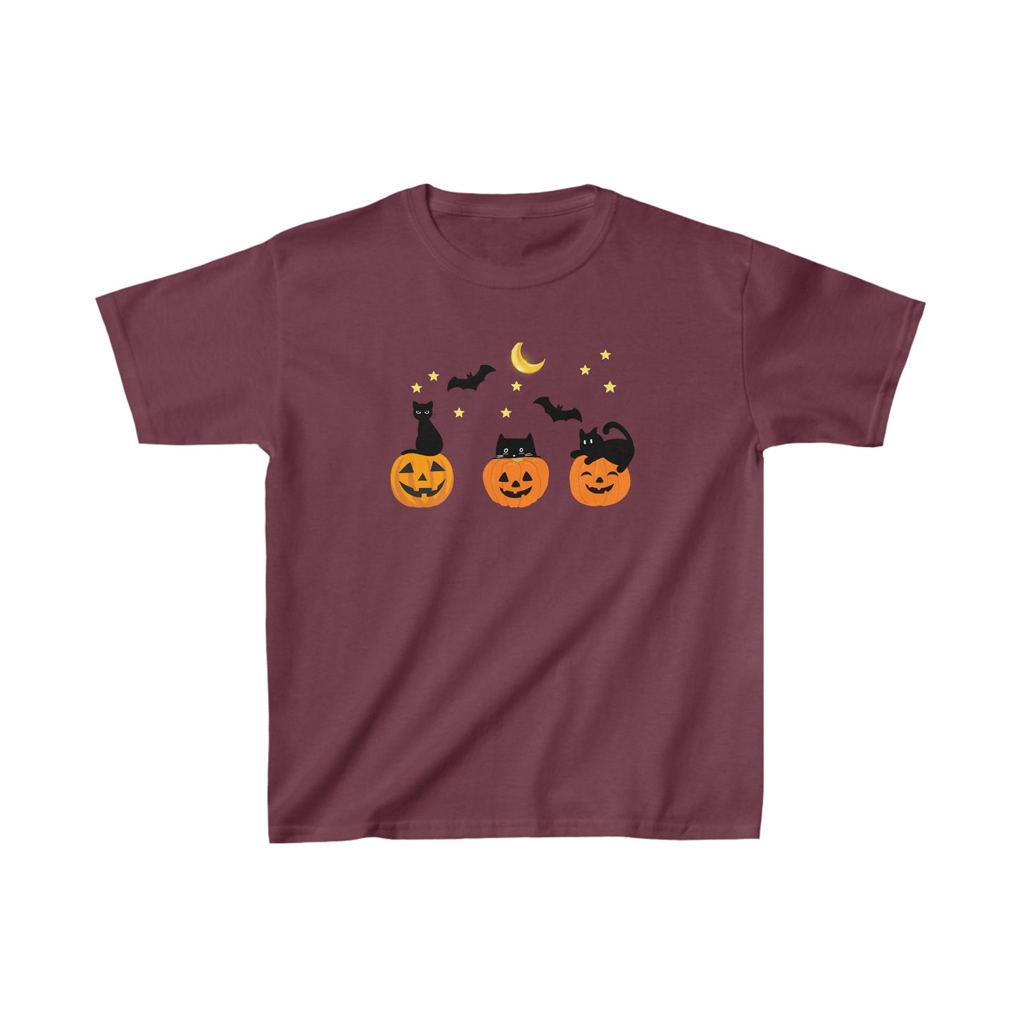 A kids' pink T-shirt with a graphic print of three smiling pumpkins and black cats against a night sky.