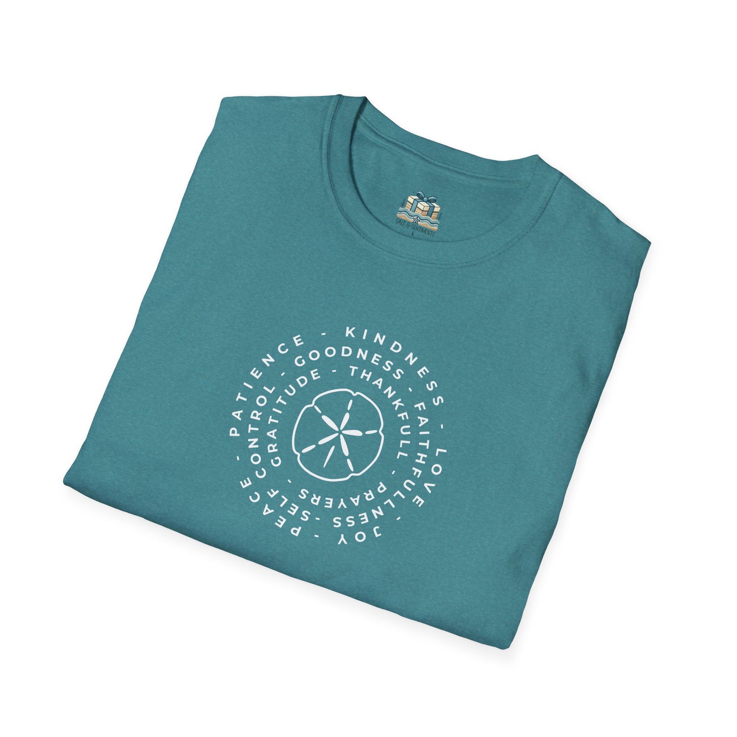 Folded teal t-shirt with white text and design on a white background