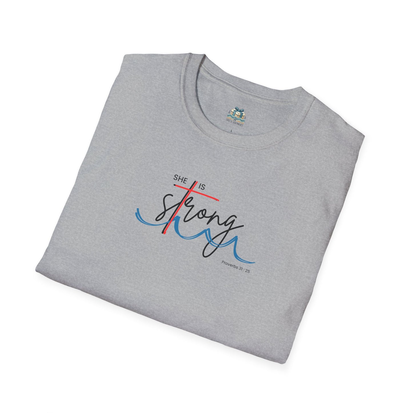 Folded gray t-shirt with 'She is Strong' text design on a white background