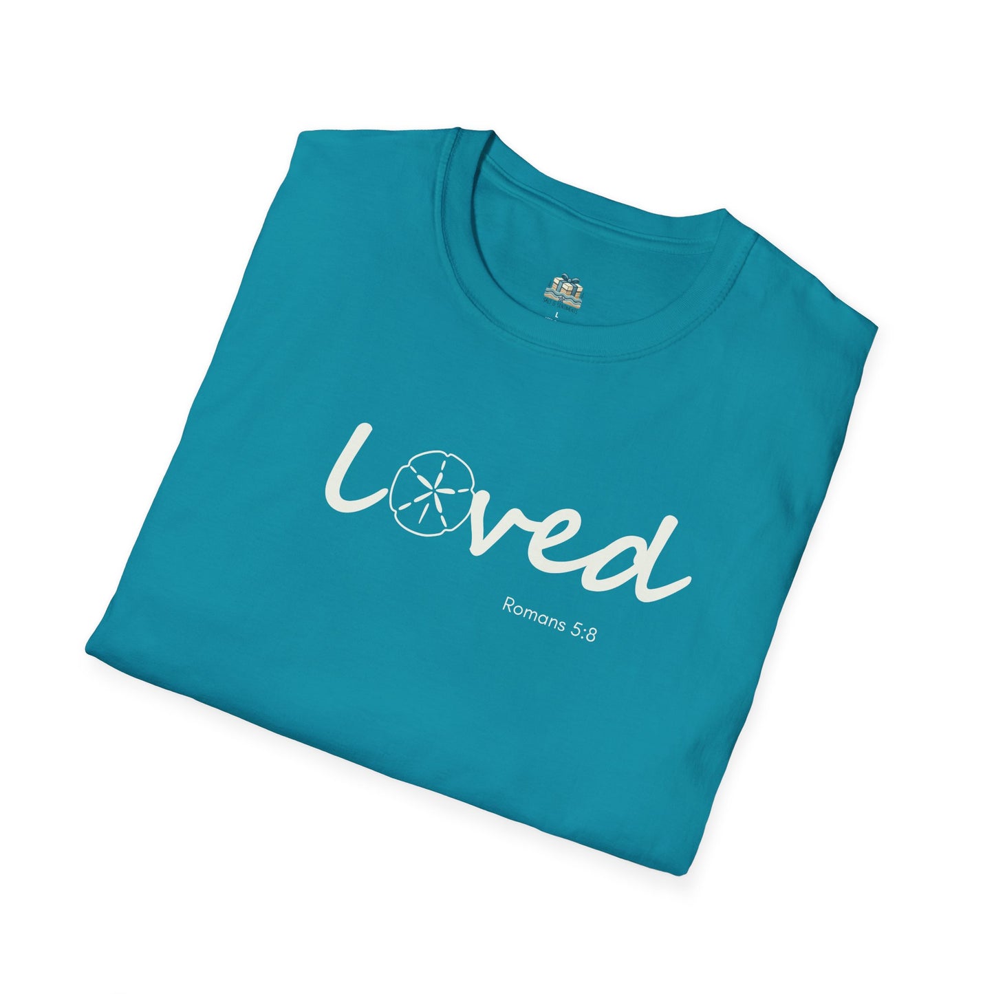 Folded teal t-shirt with 'loved' text on a white background