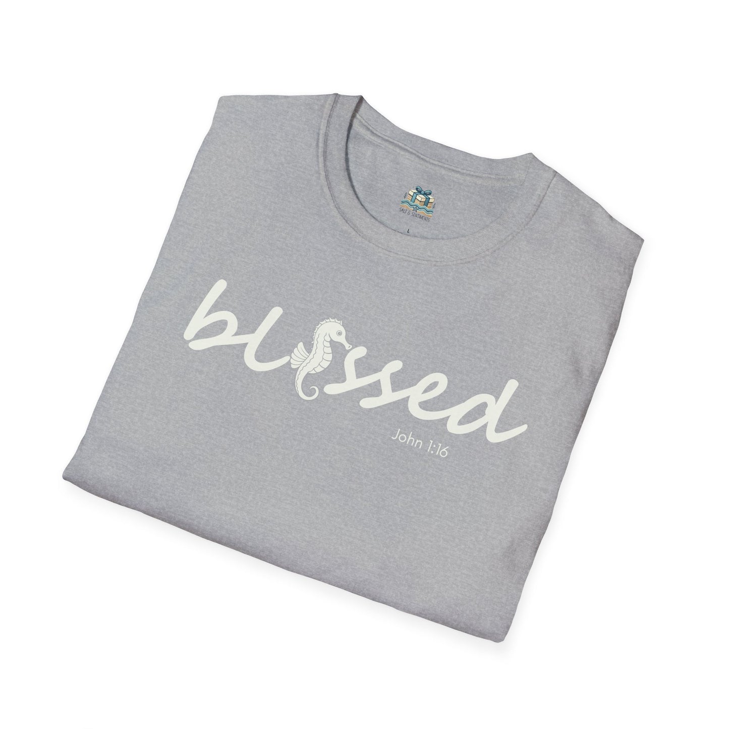 Folded gray t-shirt with 'blessed' text on a white background