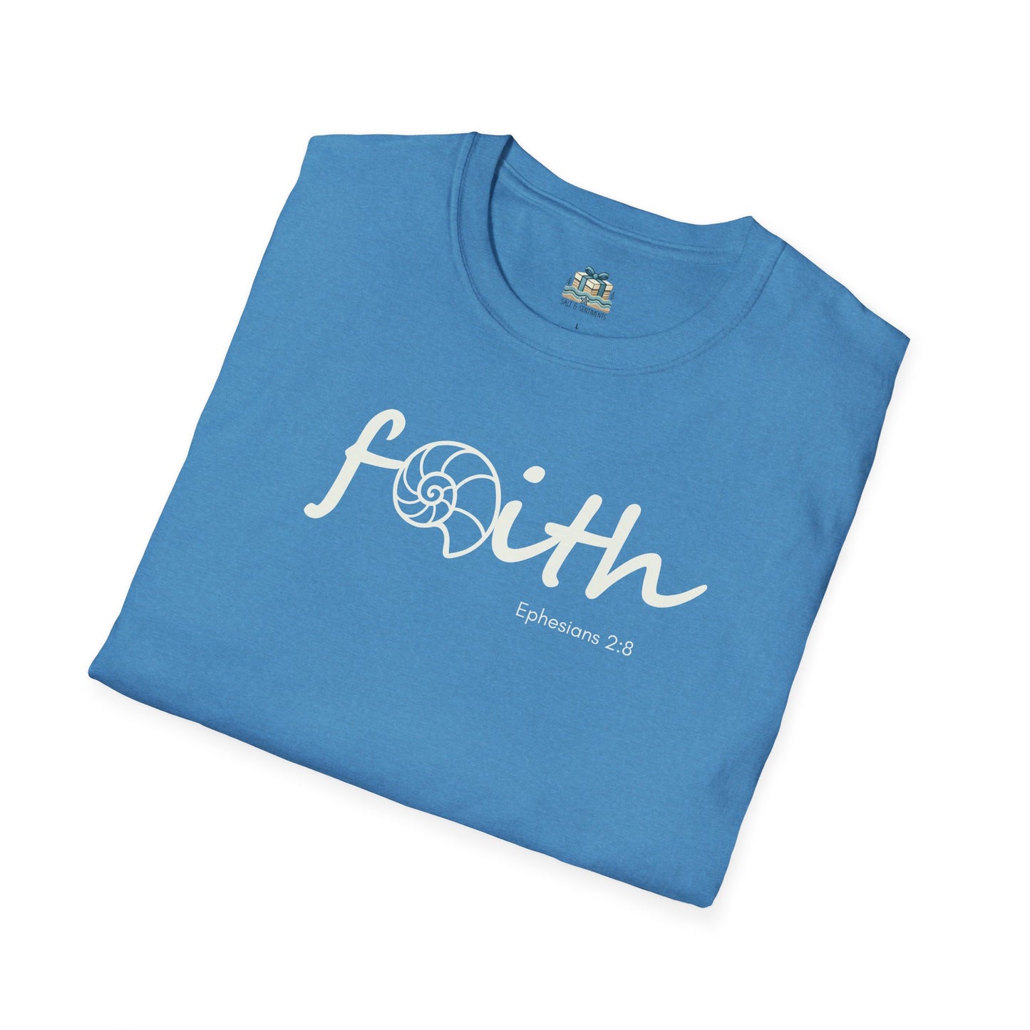 Folded blue t-shirt with 'Faith' text on a white background