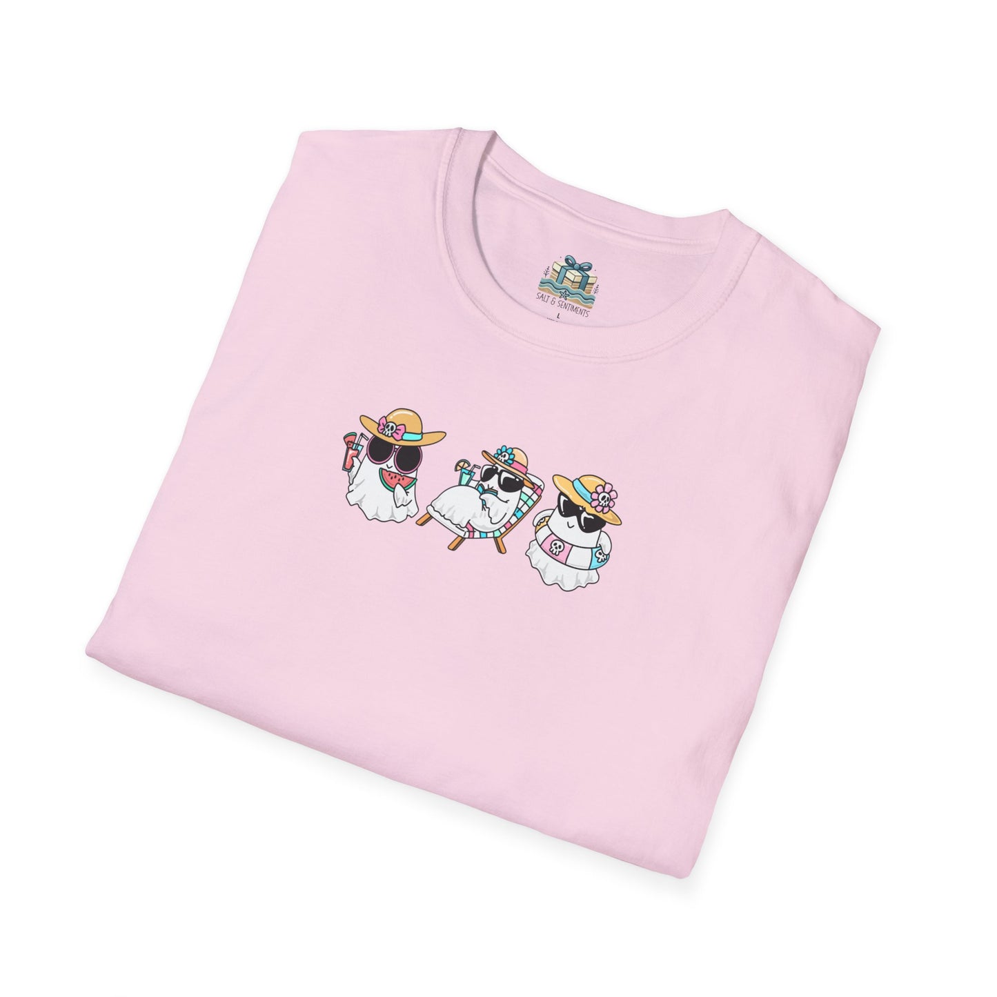 Folded pink t-shirt with cartoon sheep design on a white background