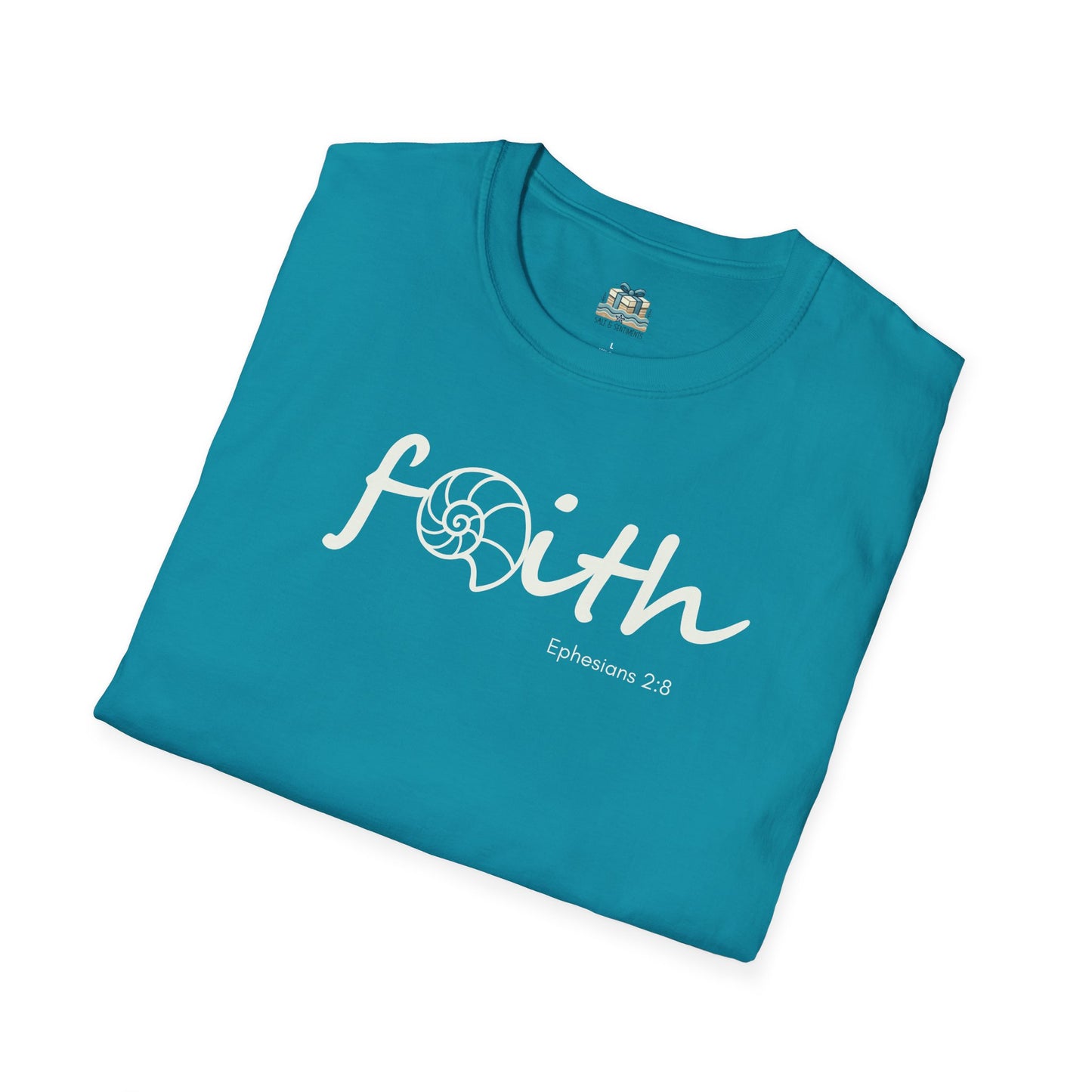Folded teal t-shirt with 'Faith' text on a white background