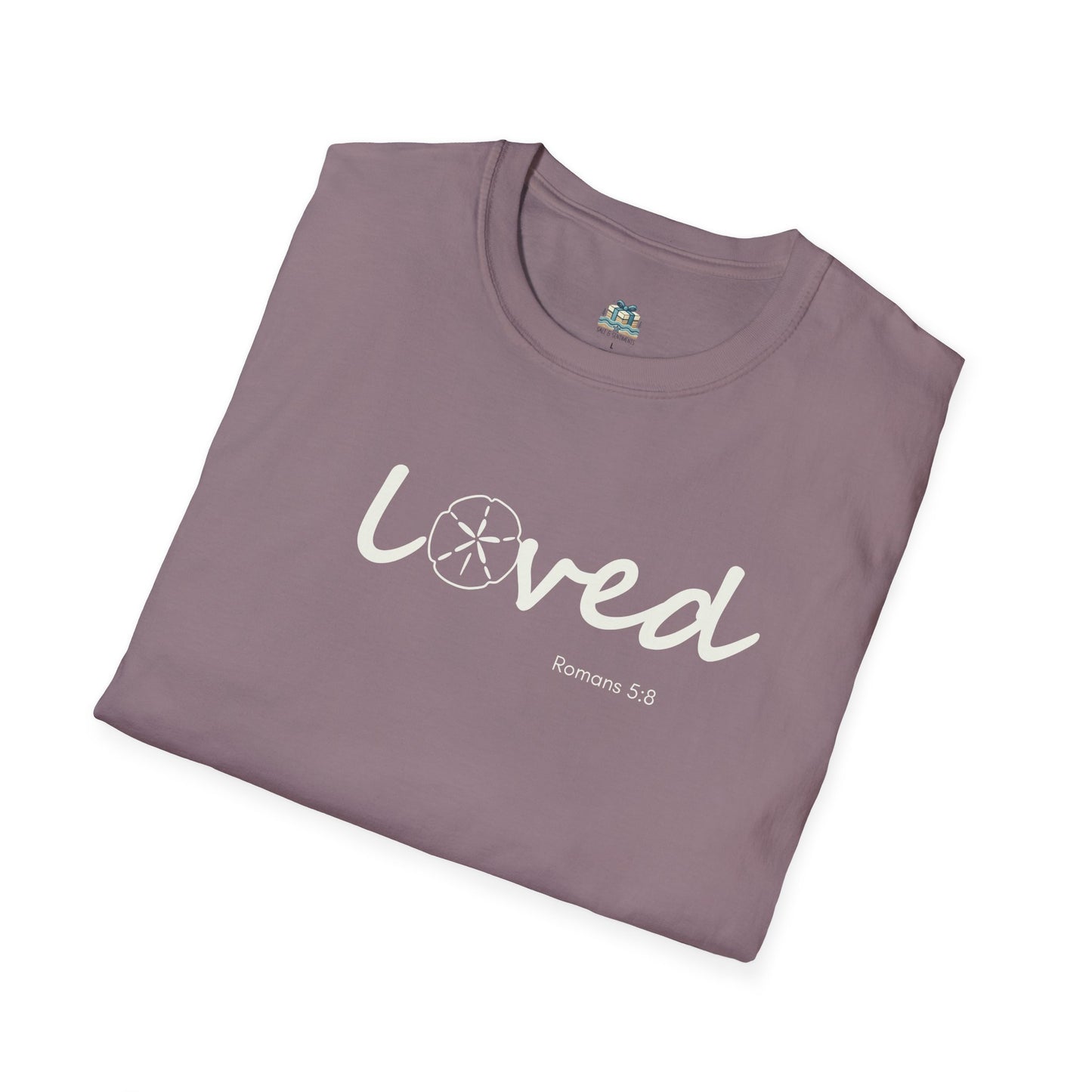 Folded purple t-shirt with 'loved' text on a white background