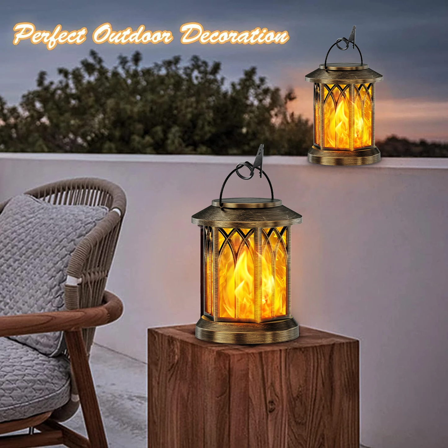 Bronze flickering flame solar lanterns glowing on a patio at sunset, with vintage design and hanging hook for outdoor decor.