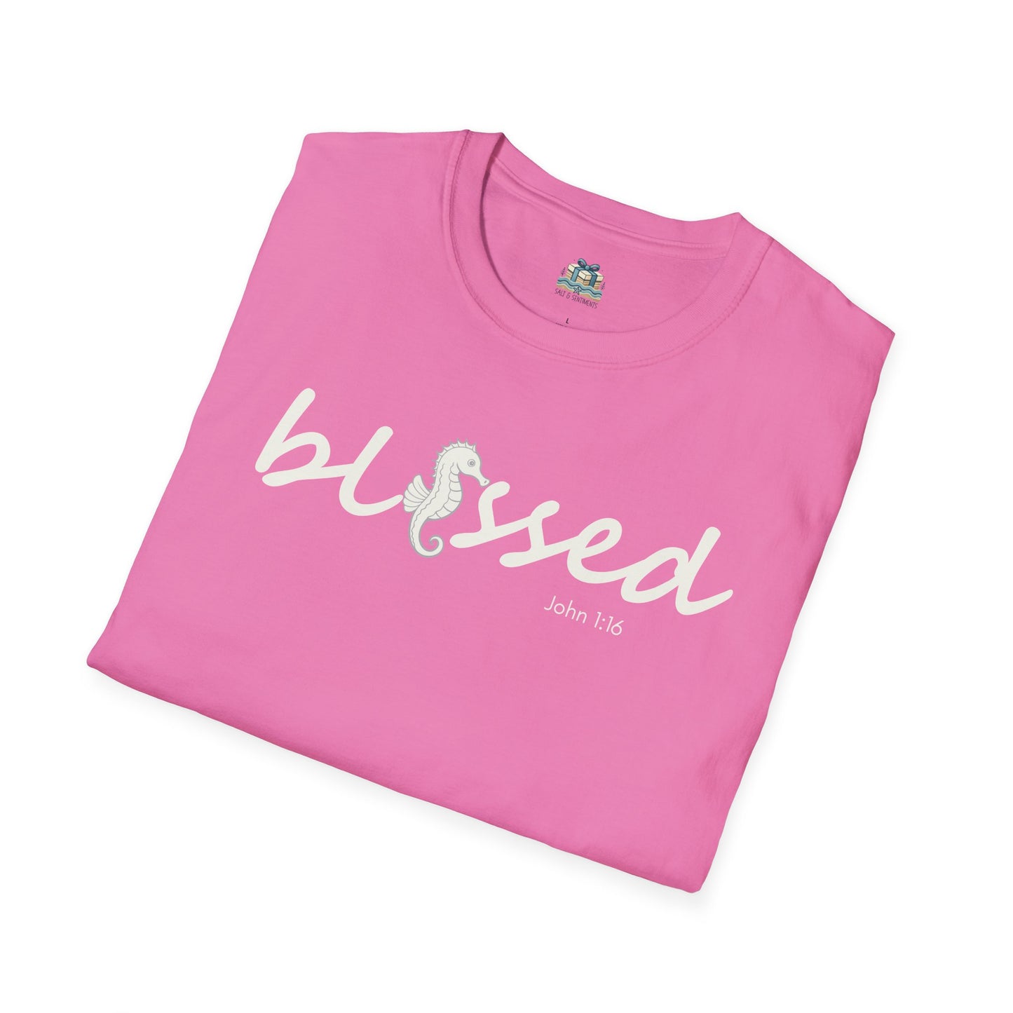 Pink t-shirt with 'blessed' text on a white background