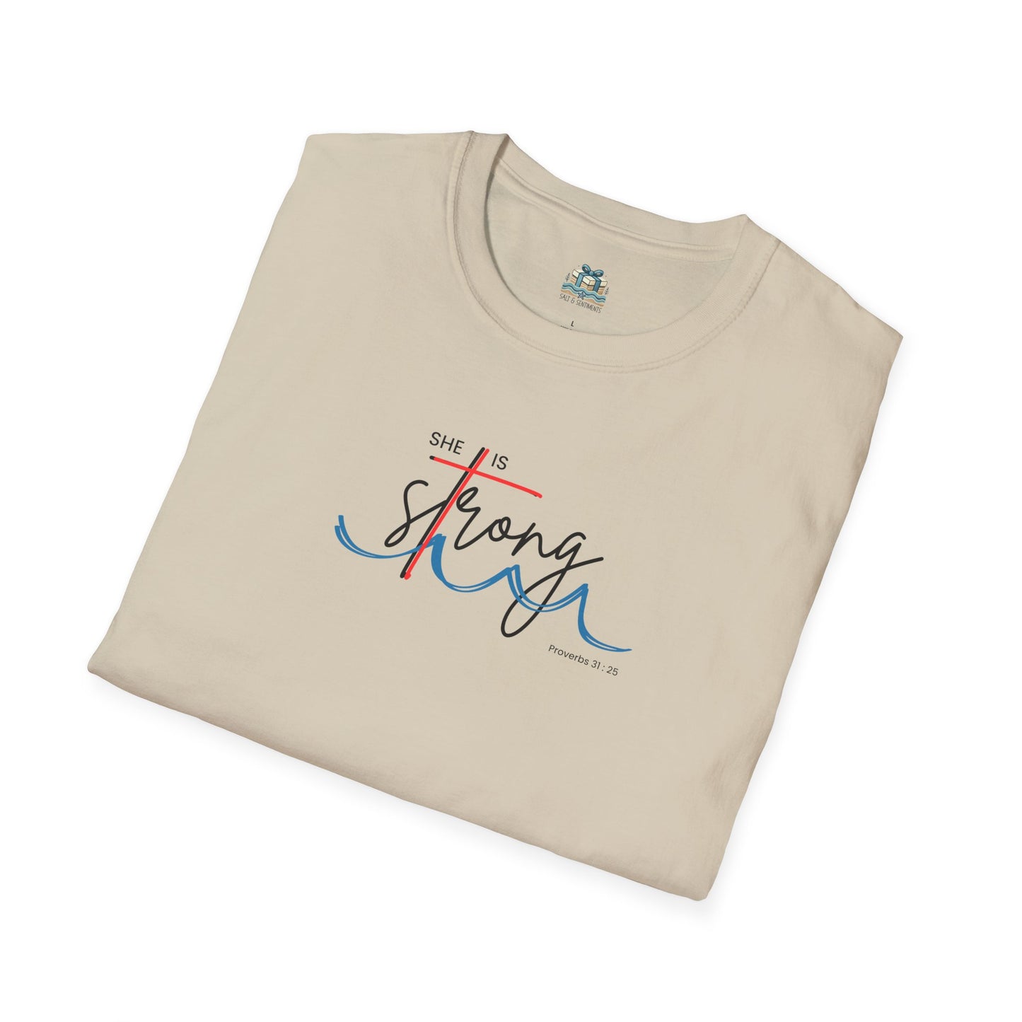 Beige t-shirt with 'She is Strong' text on a white background
