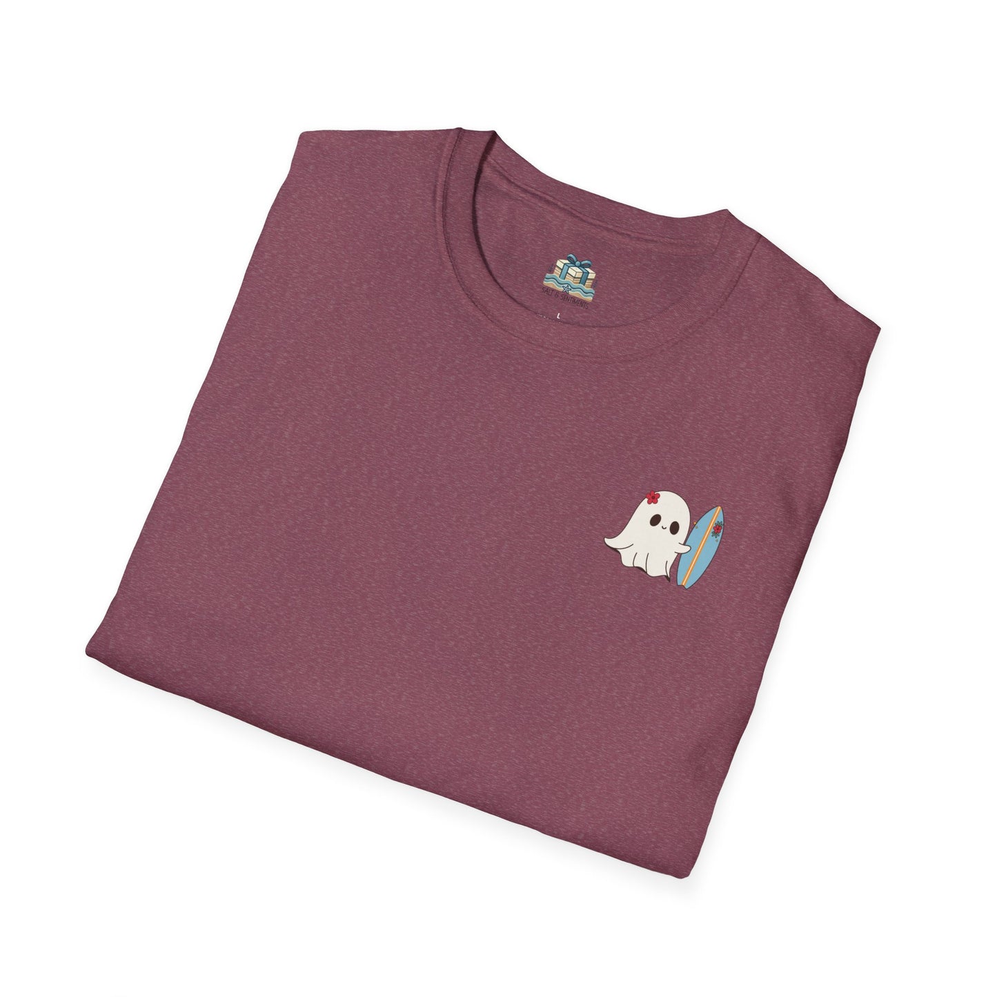 Folded maroon t-shirt with a ghost holding a surfboard graphic on a white background