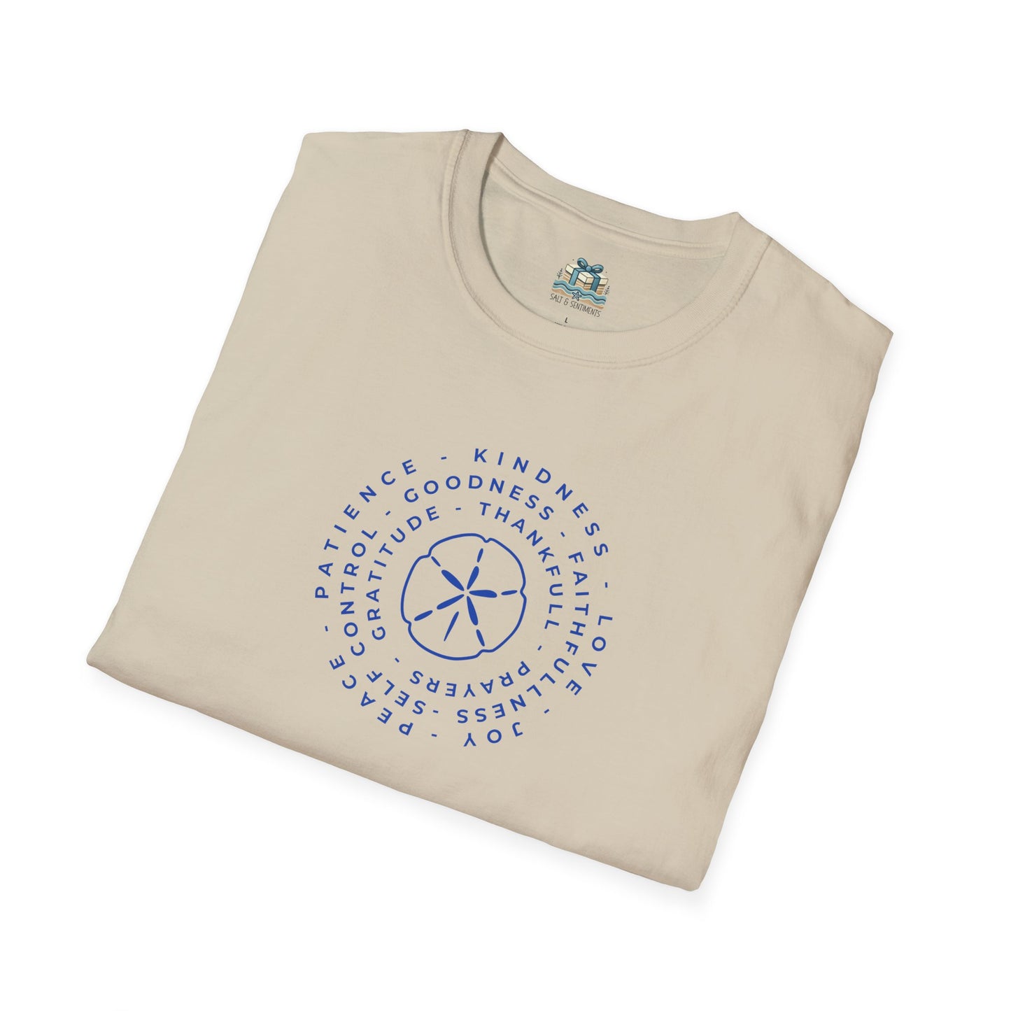 Folded beige t-shirt with blue text and design on a white background