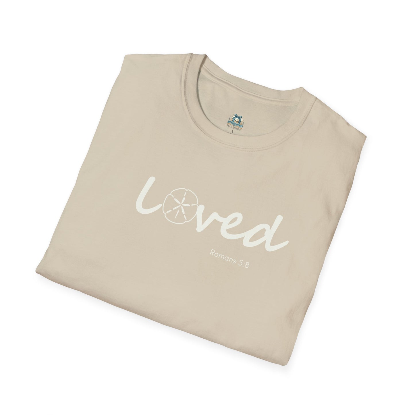 Beige t-shirt with 'loved' text on a white background