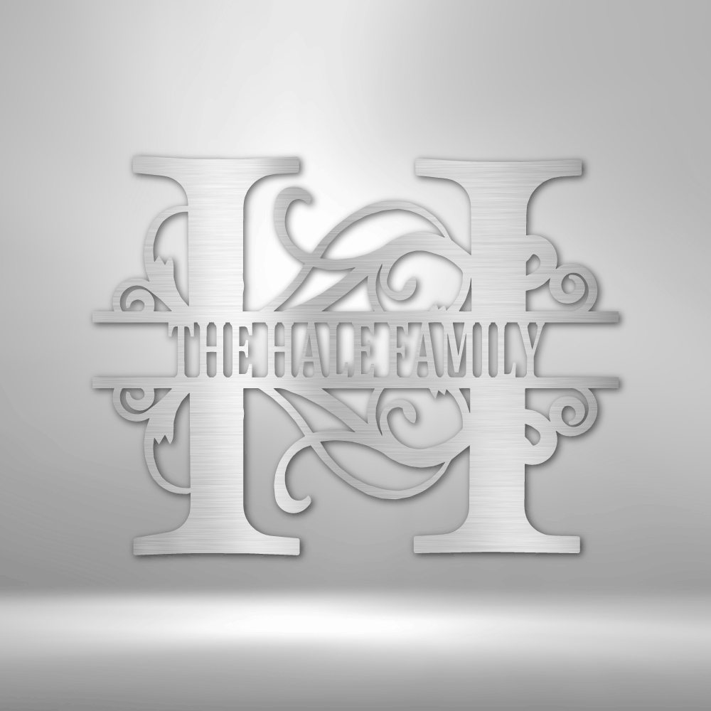 Decorative metal monogram with 'H' and 'M' on a metallic background