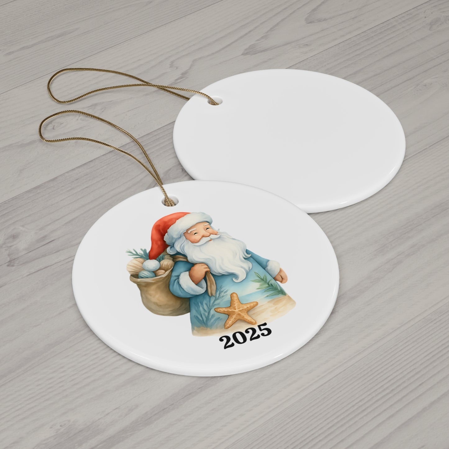 Round ceramic ornament with a Santa Claus design and '2025' on a wooden surface