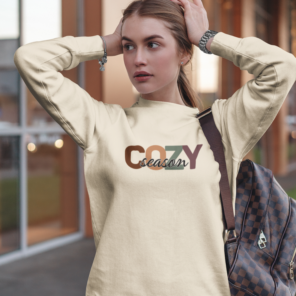 Woman wearing beige cozy season sweatshirt outdoors