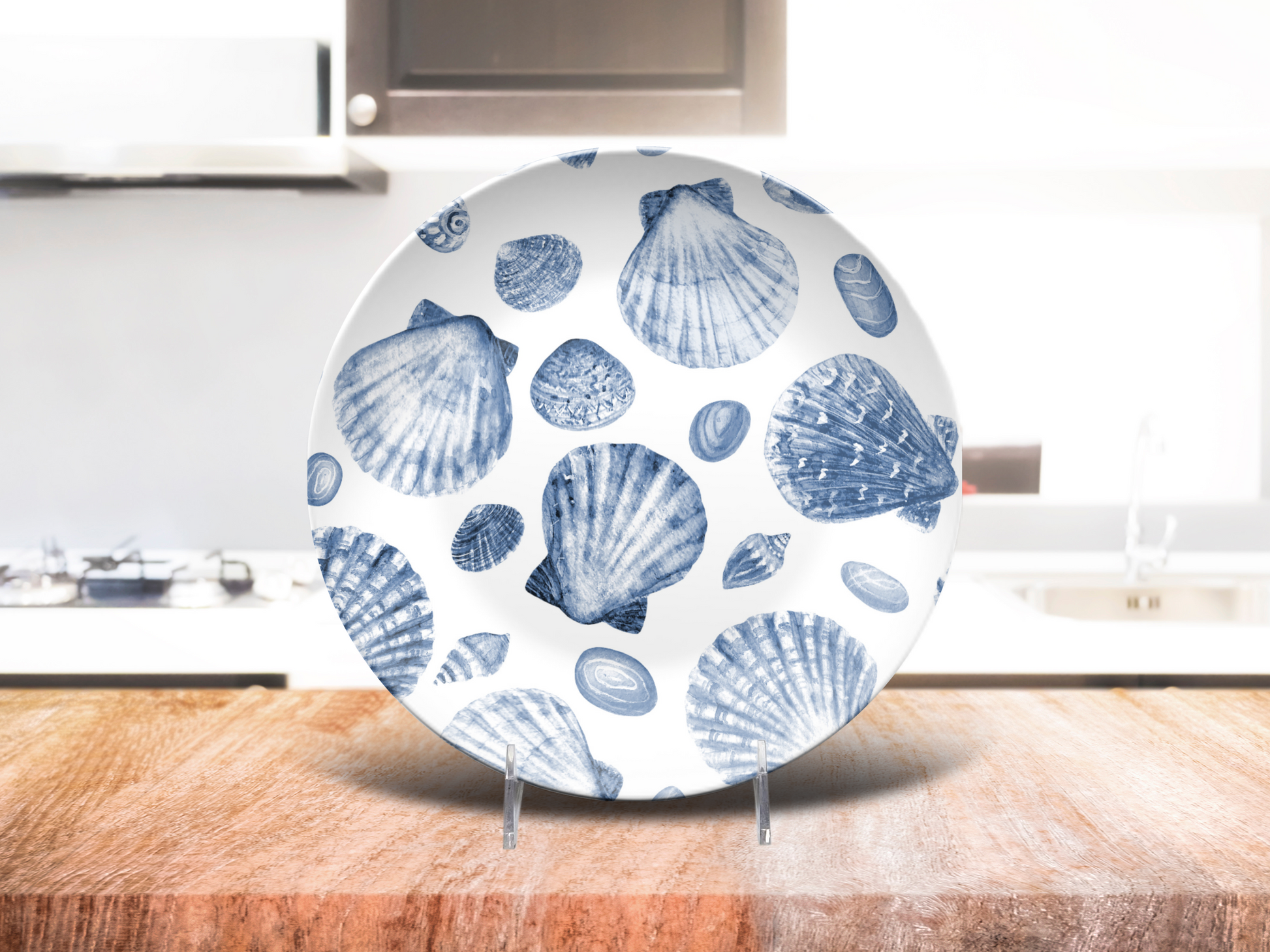 Coastal shell-themed dinner plate on kitchen counter