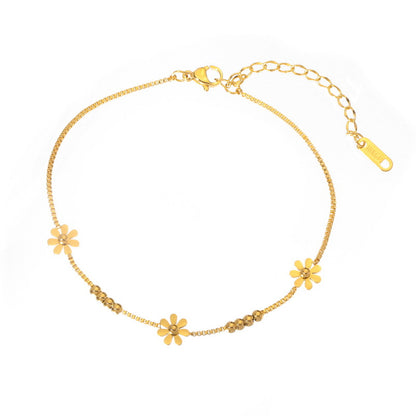 18K gold-plated floral anklet set with minimalist daisy design