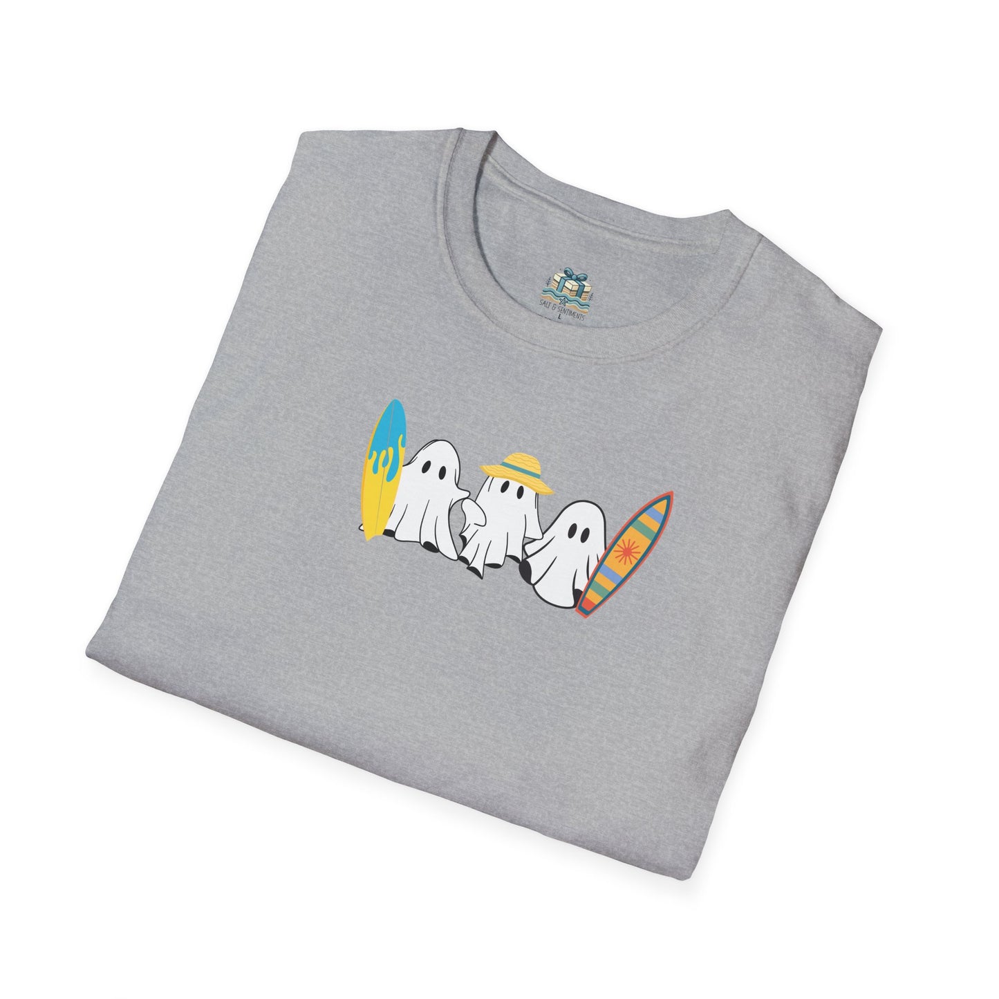 Folded gray t-shirt with cartoon ghosts design on a white background