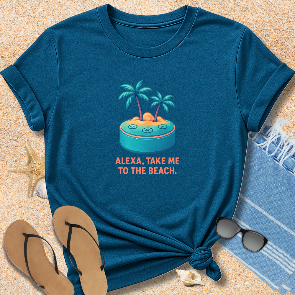 Blue t-shirt with beach graphic and text on sand with flip-flops and sunglasses.