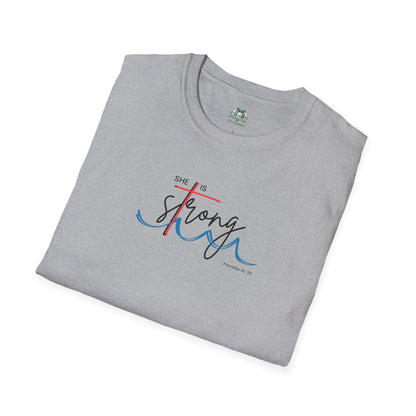 Folded gray t-shirt with 'She is Strong' text design on a white background