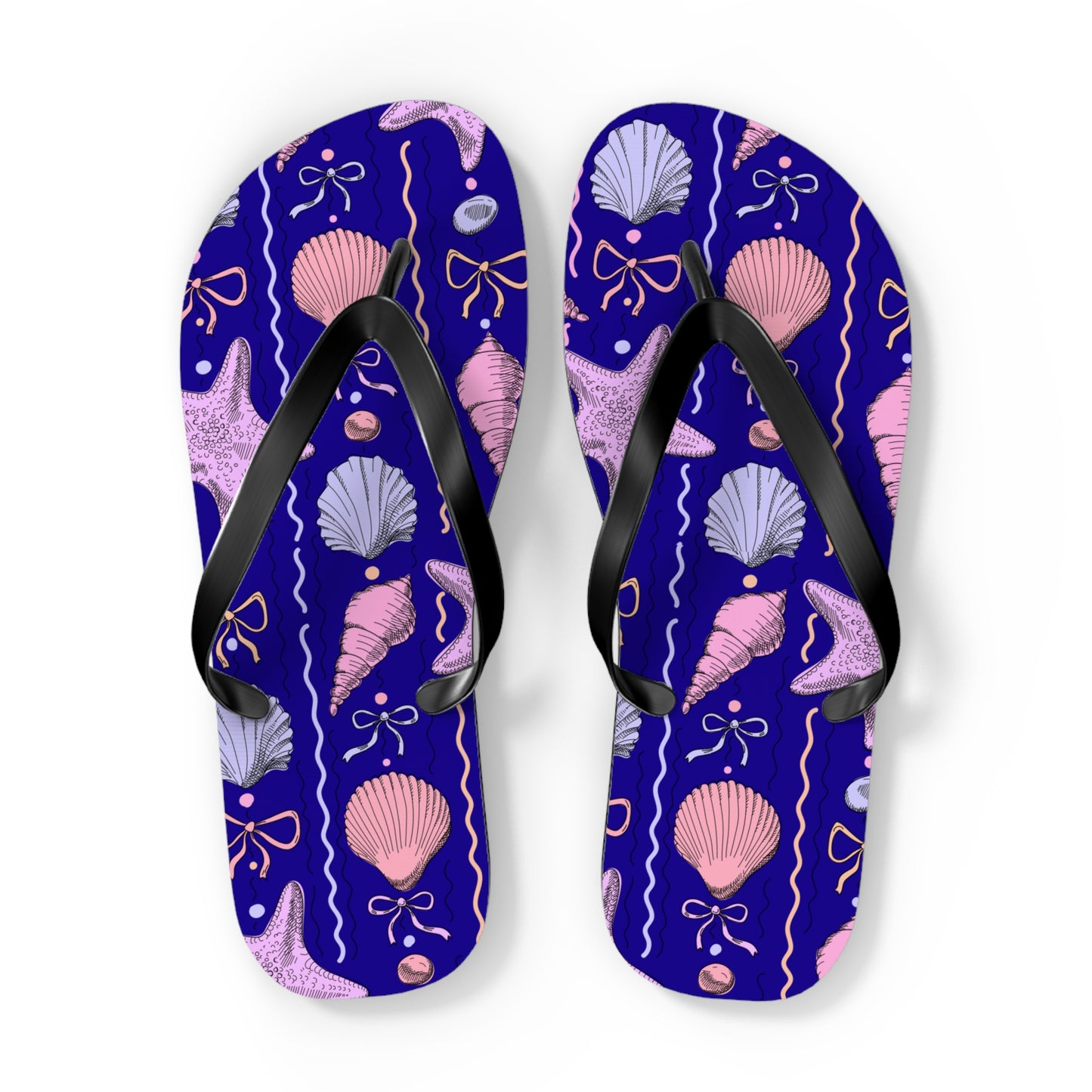 Pair of flip-flops with shell pattern on a white background