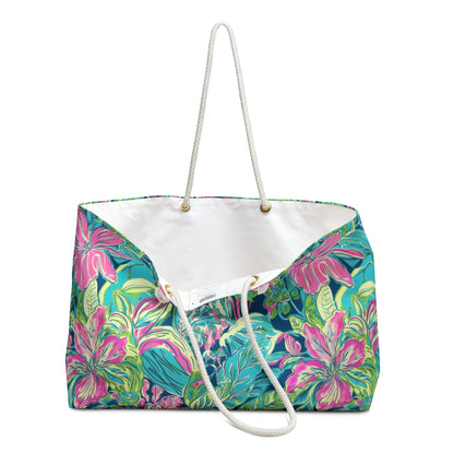 Colorful tropical floral beach bag with pink and green flowers with view of interior white linen