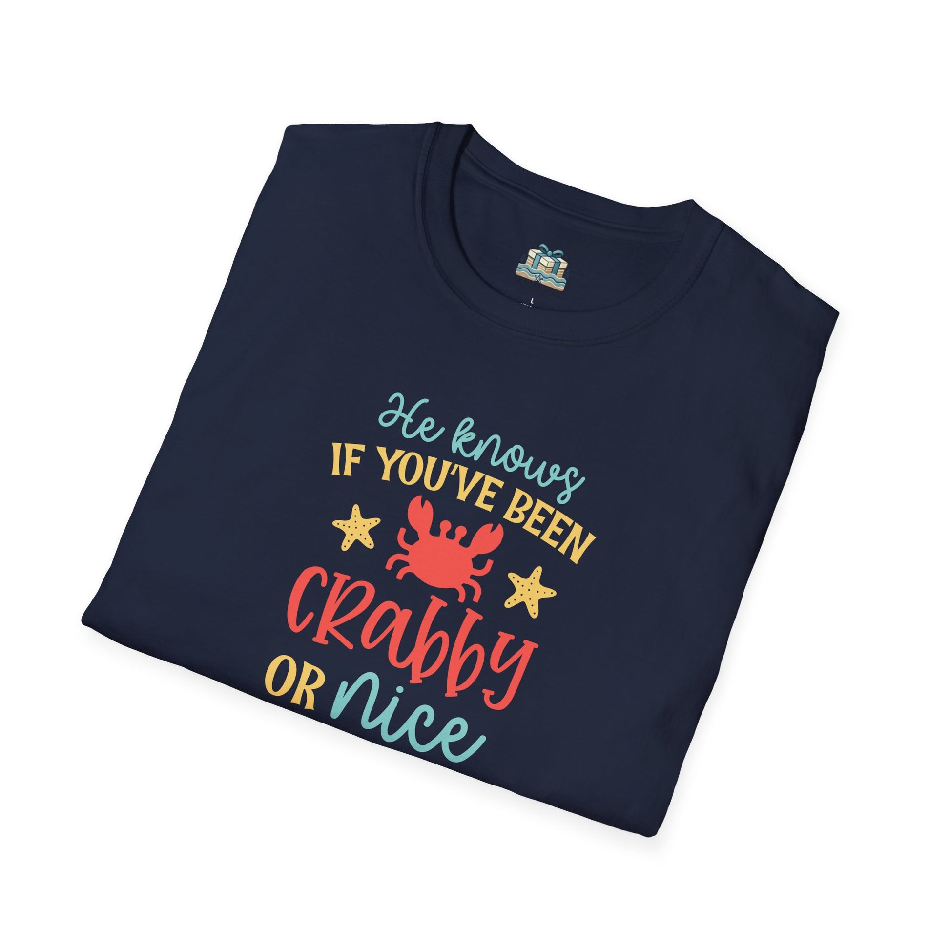 Folded navy blue t-shirt with colorful text and graphics on a white background