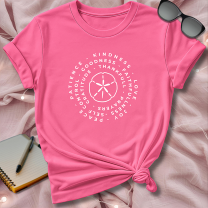 Pink t-shirt with motivational text design on a soft pink background