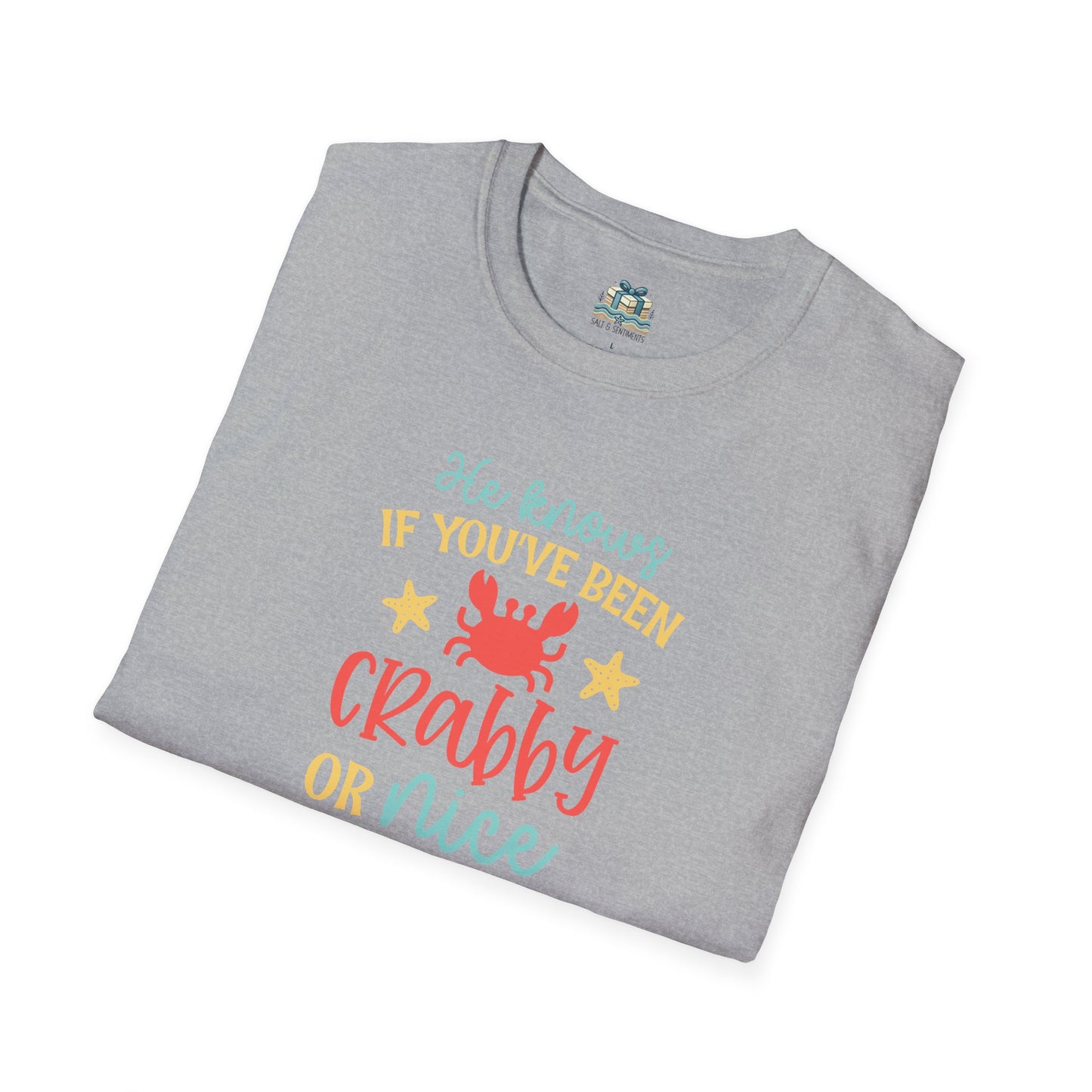 Folded gray t-shirt with colorful text and a crab graphic on a white background