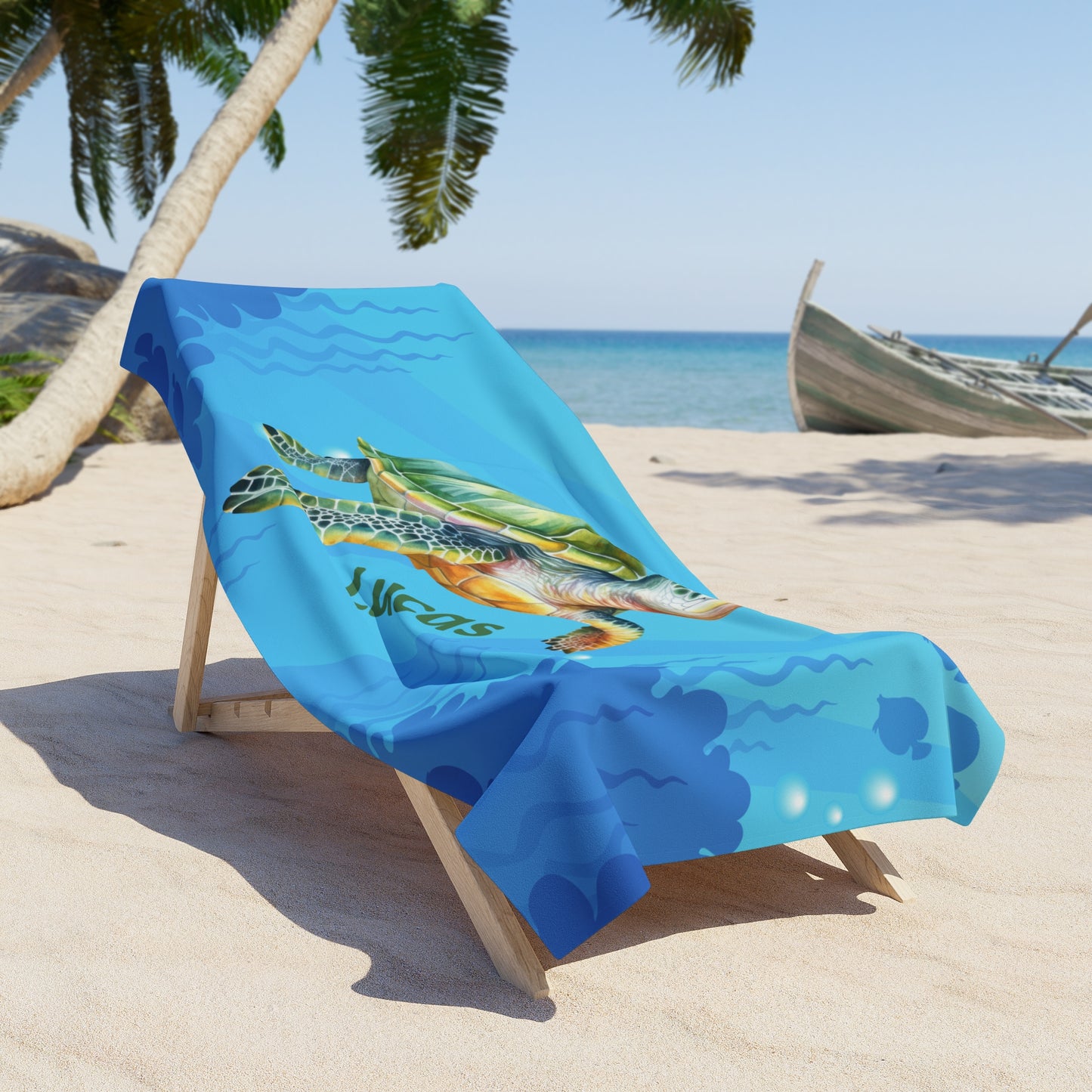 Beach towel with turtle design on a lounge chair at a beach.