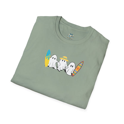 Folded green t-shirt with cartoon ghosts design on a white background