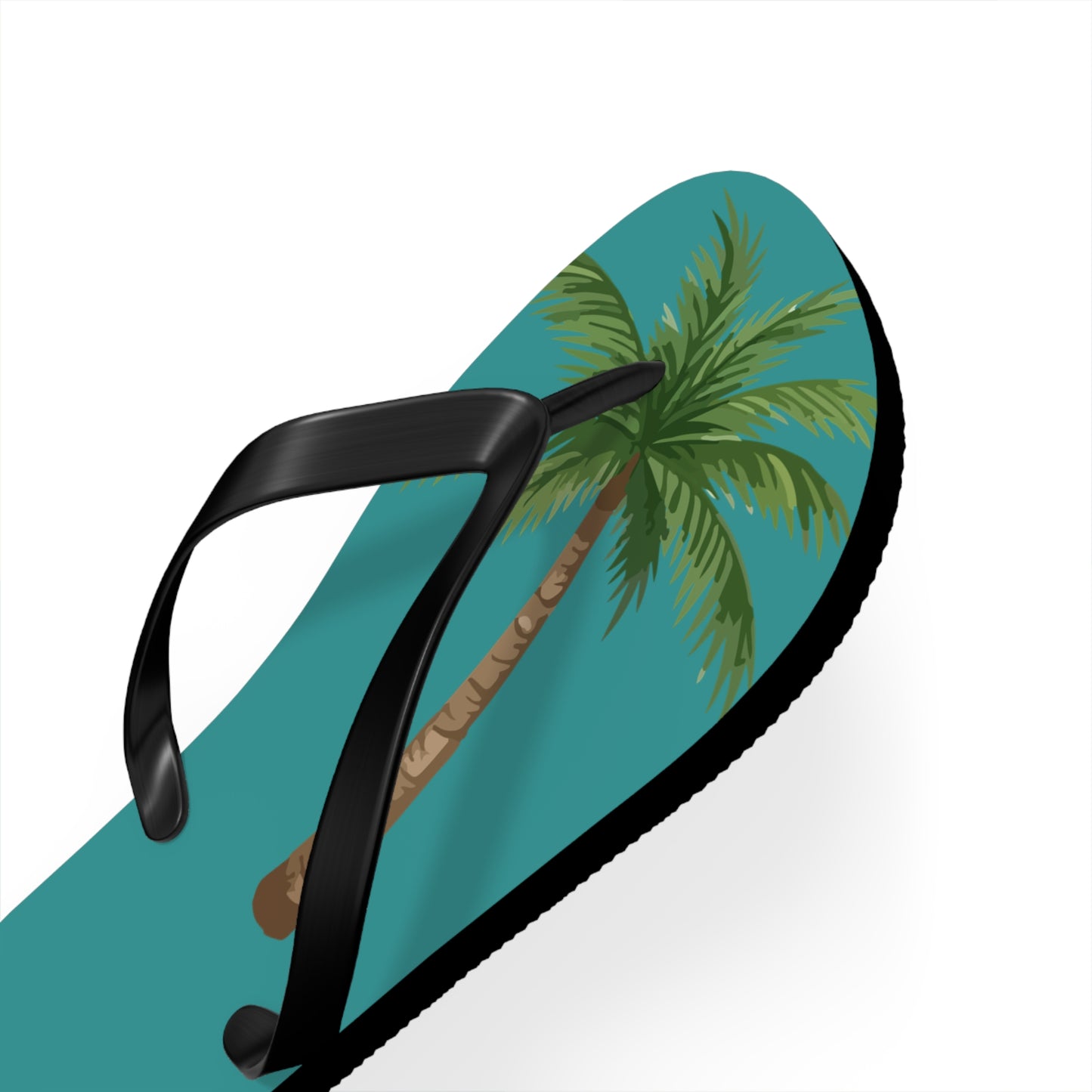 Flip-flop with a palm tree design on a teal sole against a white background