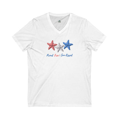 White V-neck T-shirt with red, white, and blue starfish and the phrase "Proud, Free & Sun-Kissed" printed on the front.
