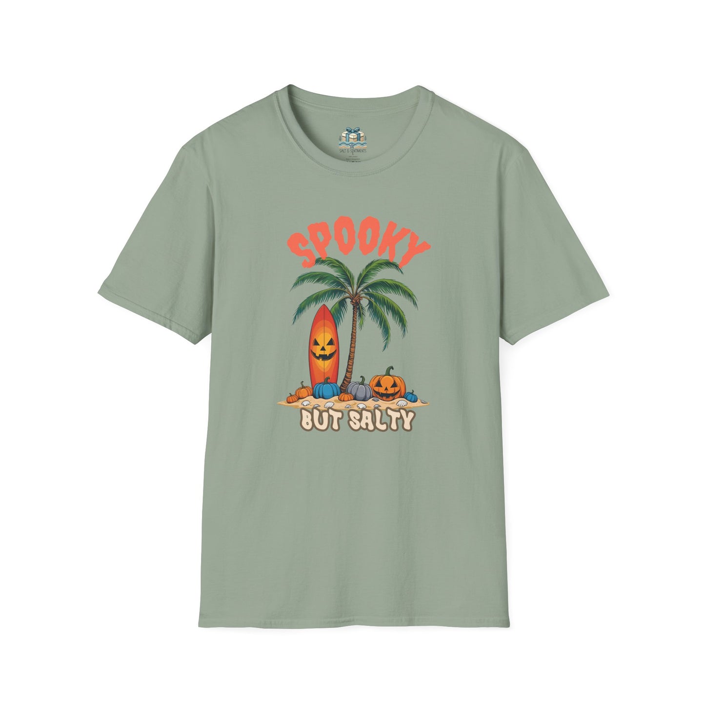 Green t-shirt with Halloween-themed design featuring a palm tree, surfboard, and pumpkins on a white background.