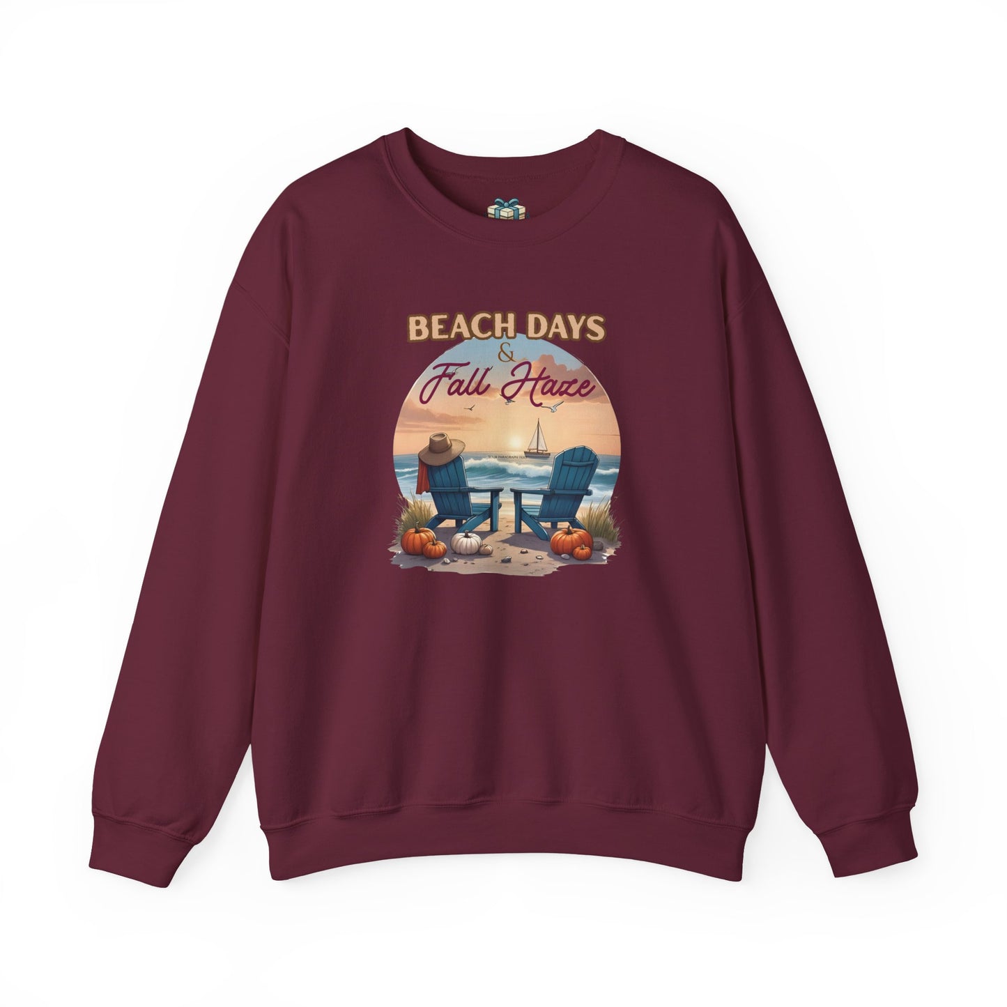 Maroon sweatshirt with beach-themed graphic and text on a white background