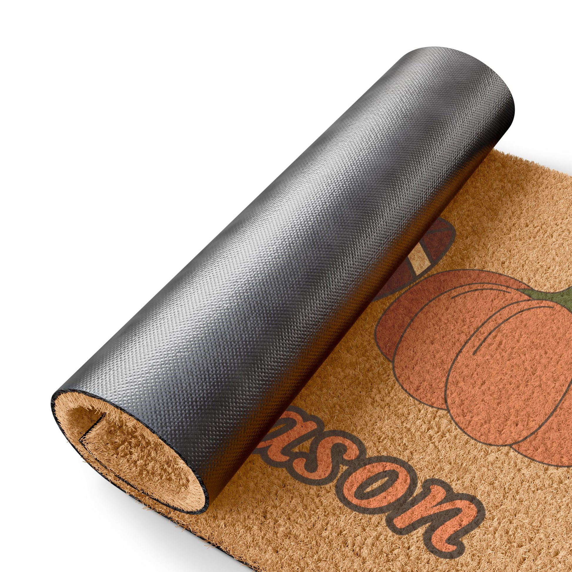 Doormat with 'Wilson' printed on it, featuring pumpkins, rolled up on a white background.