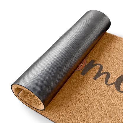 Doormat with 'Welcome' text on a white background