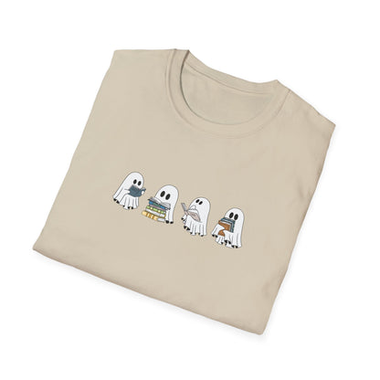 Flat lay of spooky cute reading-themed Halloween t-shirt with fall decorations.

