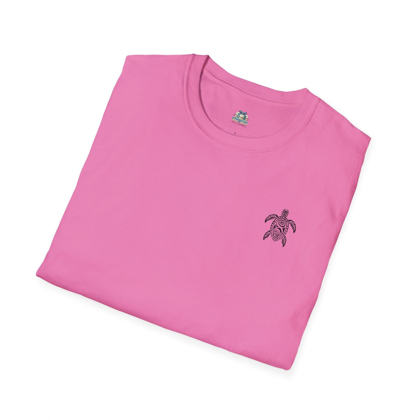 Folded pink t-shirt with a turtle emblem on a white background