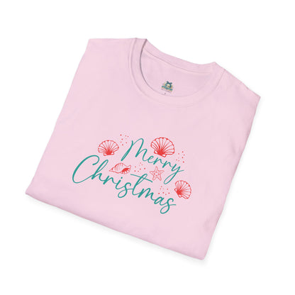 Folded pink t-shirt with 'Merry Christmas' text and festive graphics on a white background