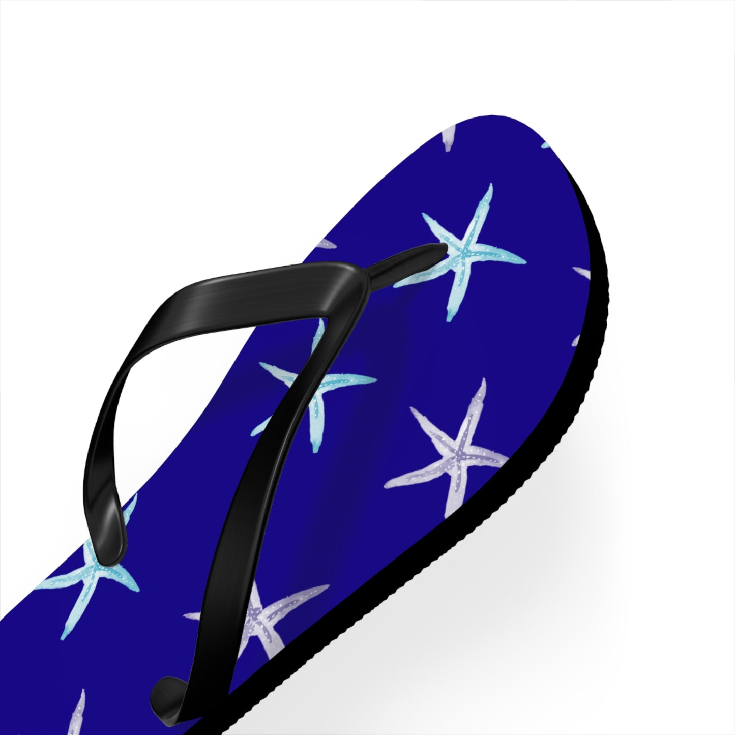 Blue flip-flop with starfish pattern on a white background