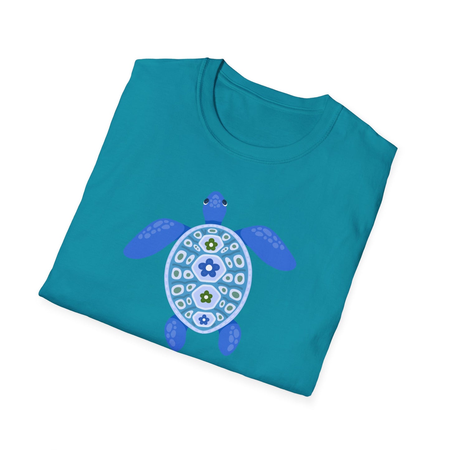 Folded teal t-shirt with a blue turtle design on a white background