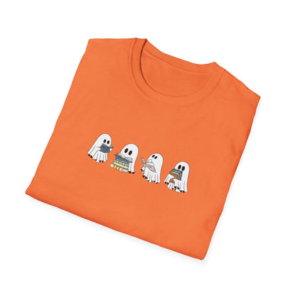 Orange t-shirt with ghost and book illustrations styled for autumn.