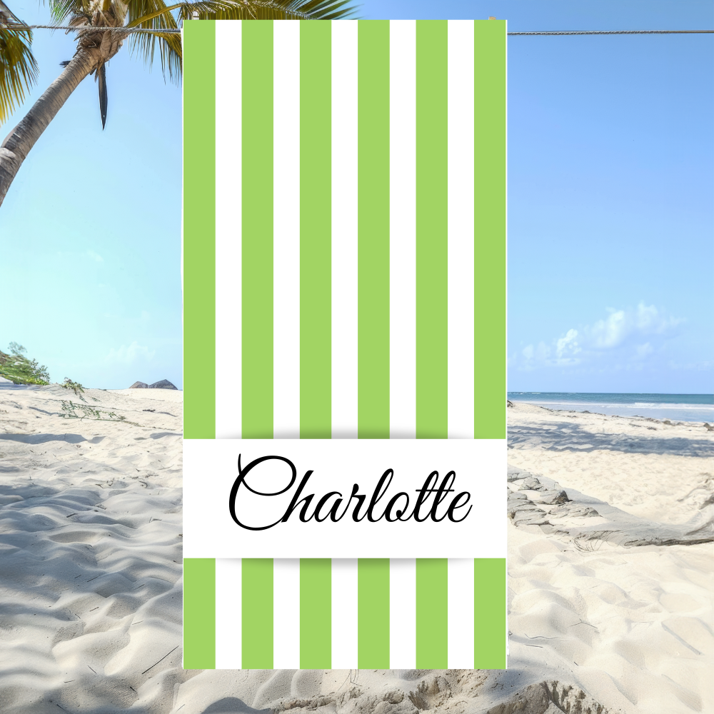 Striped towel with 'Charlotte' text on a beach setting