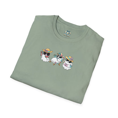 Folded green t-shirt with a graphic of three cartoon dogs wearing sunglasses and hats on a white background.