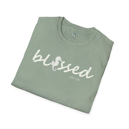 Folded green t-shirt with 'blessed' text on a white background