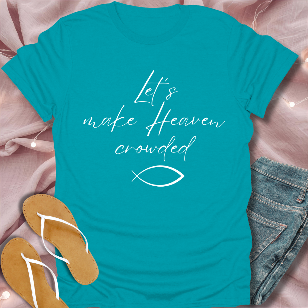 Blue t-shirt with text and fish symbol on a pink fabric background