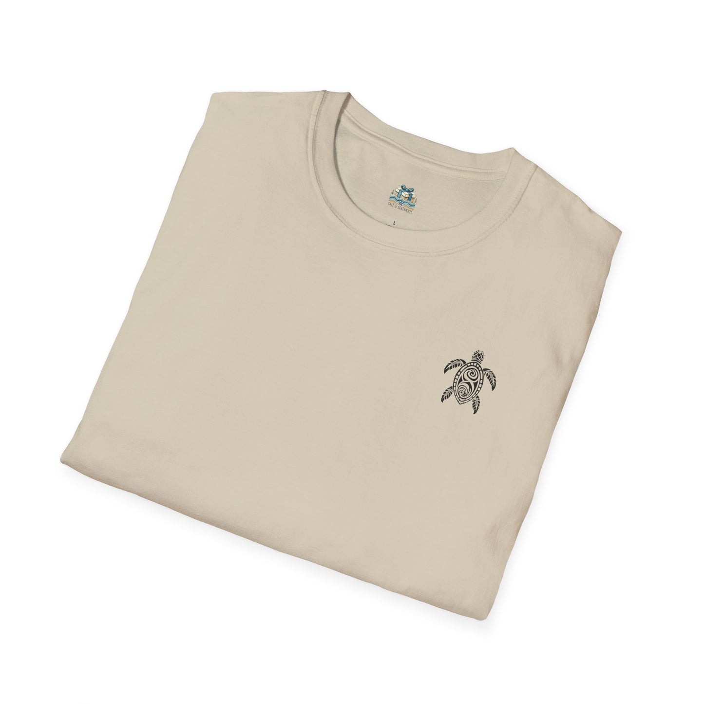 Folded beige t-shirt with a turtle emblem on a white background