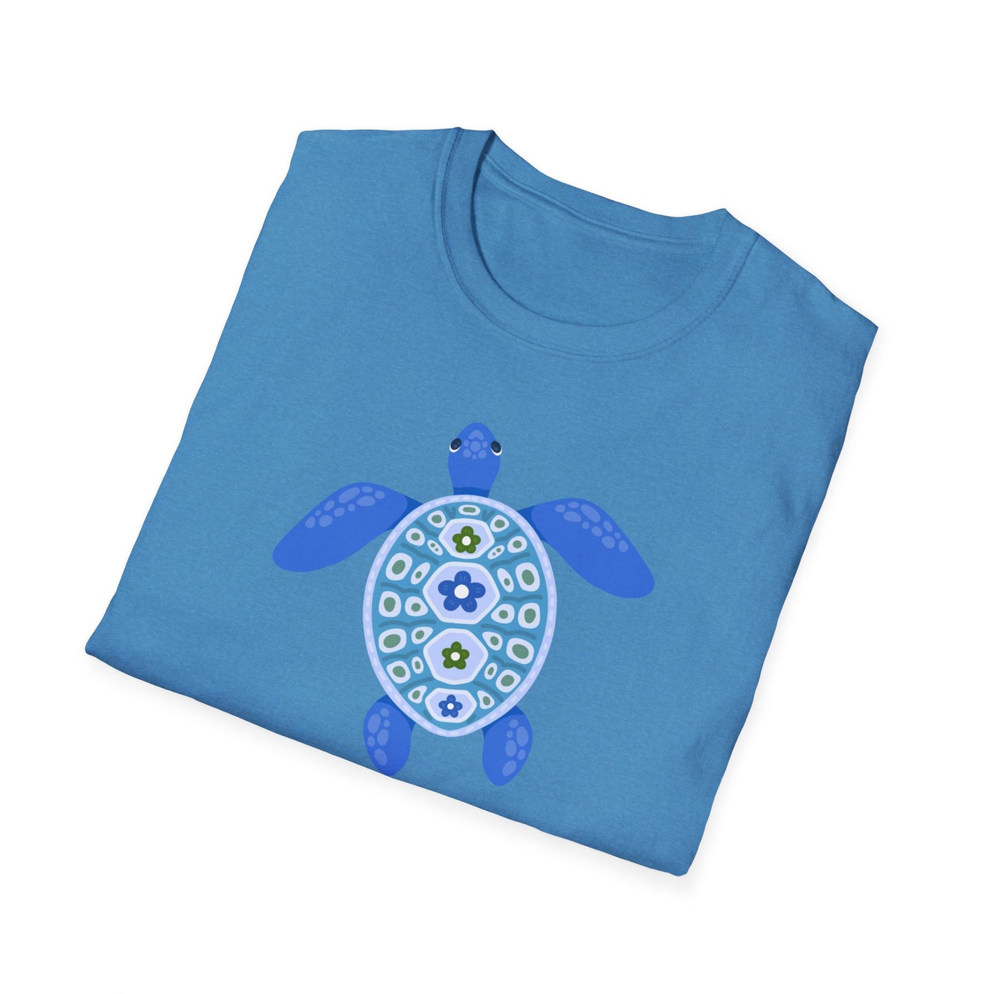 Folded blue t-shirt with a turtle design on a white background